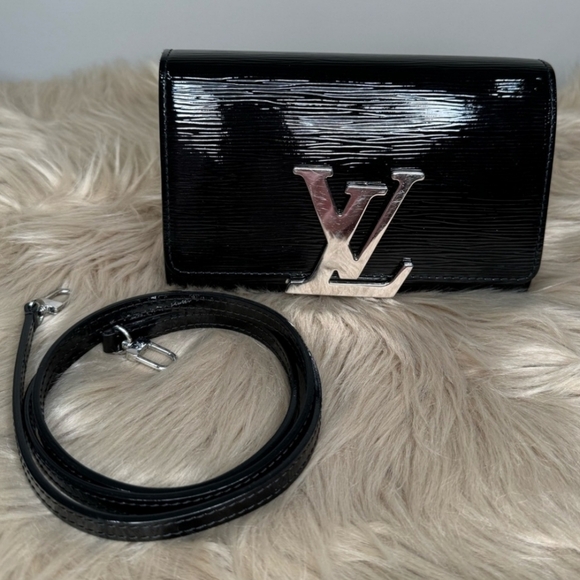 Louis Vuitton Handbags - Louis Vuitton Black Clutch with Silver Logo